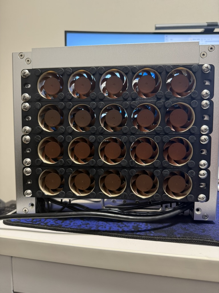 Front view of the server rack showing a wall of Noctua fans